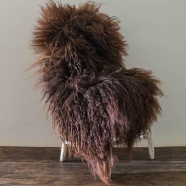 Huling worked directly with a farm upstate during its breeding process to procure sheepskins in rich chocolate and caramel colors for this spring. Photo: Marlow Goods